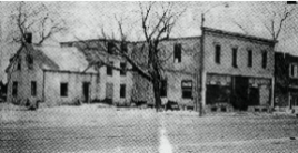 On the left is the house where Elizabeth was born, 1925. Caption of this newspaper photo (from the Carillon Dec. 3, 1975): The old H.W. Reimer Store in Steinbach just before it was broken down after closing permanently in January, 1964. This was Steinbach’s oldest business, established in 1886 by the late Henry W. Reimer. At the time of its last remodelling in 1914, the store, with 17,600 square feet, had no equal size in rural Manitoba and only a few stores in Winnipeg were larger or better stocked. For 75 years, the store was an institution familiar to practically everyone in southeastern Manitoba. Its exit from the scene was particularly painful to dozens of oldtimers who spent long hours around the ‘cracker barrel’ in the corner in the hardware department and who found the post office a poor substitute after the store was gone