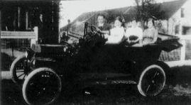 Elizabeth’s father, John H.W. Reimer, teaching his sister Margaret to drive. 1918. Passengers unknown